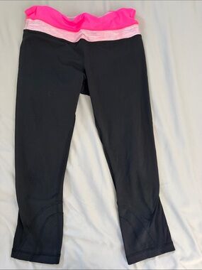 lululemon athletica Black Capri Leggings with Hot Pink Fold-Over Waistband